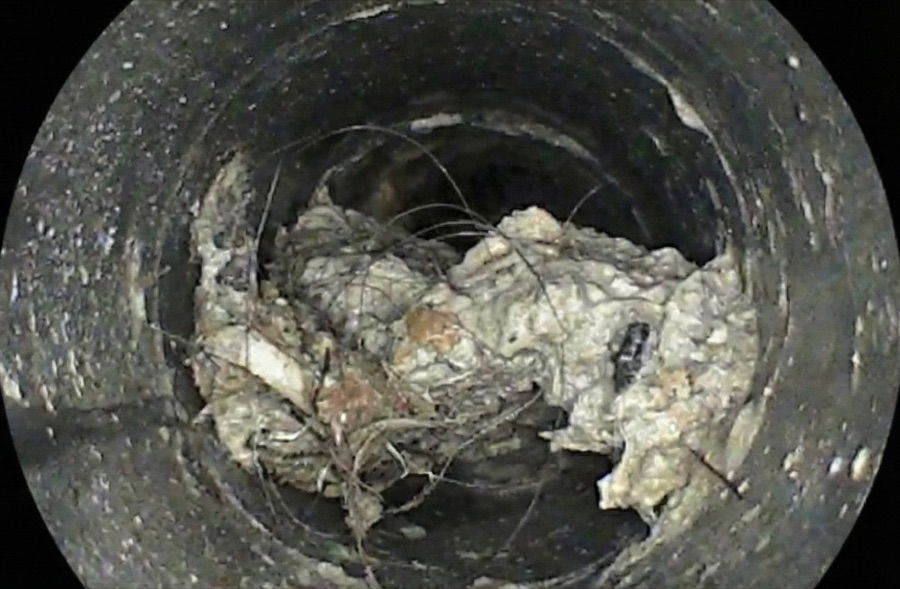 What CheckIT sees: Endoscope camera: construction debris left in the pipe